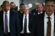 Le cofondateur de Microsoft  Bill Gates (au centre - © AFP