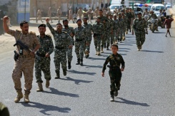 Des partisans des autorités houthies défilent lors d'un rassemblement visant à recruter de nouveaux combattants, le 10 septembre 2026 à Sanaa, au Yémen - © AFP/Archives - Mohammed HUWAIS Des partisans des autorités houthies défilent lors d'un rassemblement visant à recruter de nouveaux combattants, le 10 septembre 2026 à Sanaa, au Yémen - © AFP/Archives - Mohammed HUWAIS