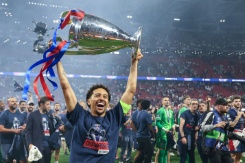 Marquinhos et le reste du Paris Saint-Germain célèbrent leur victoire en Ligue des Champions face à Arsenal, le 30 mai 2026 au Puskas Arena de Budapest - © AFP - Franck FIFE Marquinhos et le reste du Paris Saint-Germain célèbrent leur victoire en Ligue des Champions face à Arsenal, le 30 mai 2026 au Puskas Arena de Budapest - © AFP - Franck FIFE